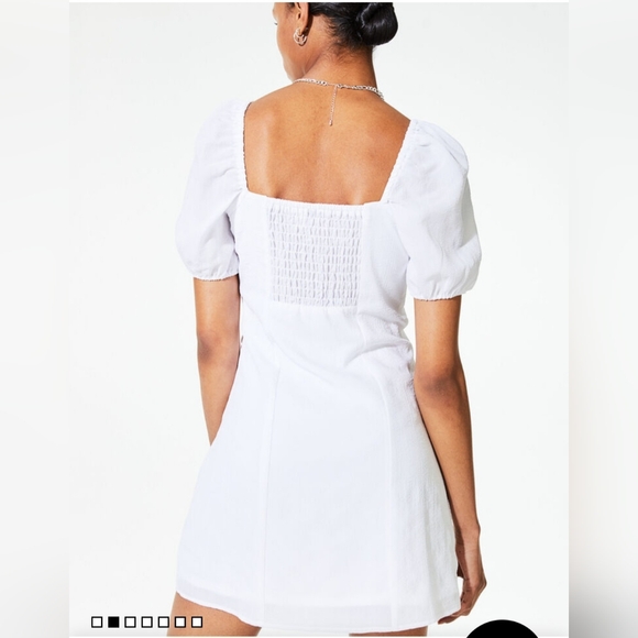 Divided White Sheath Mini Dress with Puff Sleeves - Picture 2 of 5